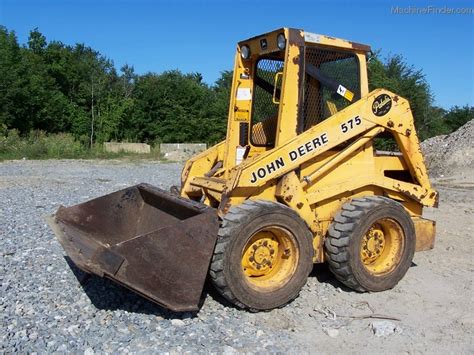 john deere 575 skid steer hydraulic pump|value john deere skid steer.